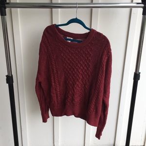Red cable knit sweater